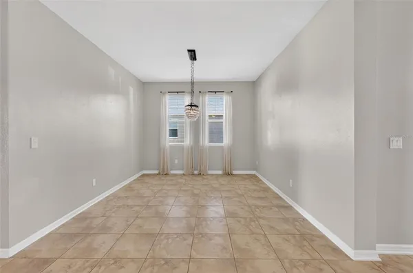 a view of a kitchen with a sink and a window