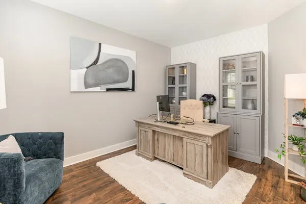 a kitchen with a stove and a couch