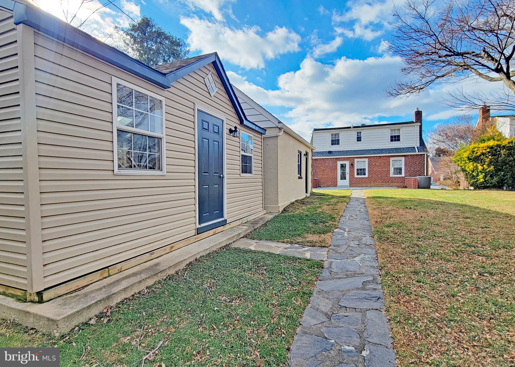 409 Perry Street Ridley Park, PA 19078 - Photo 12 of 66 a front view of a house with garden