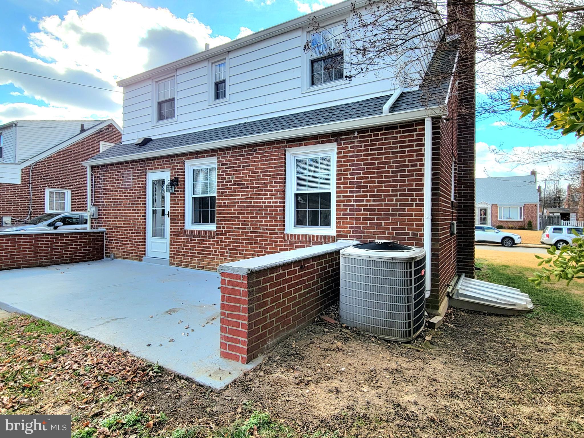 409 Perry Street Ridley Park, PA 19078 - Photo 25 of 66 a front view of a house with a yard