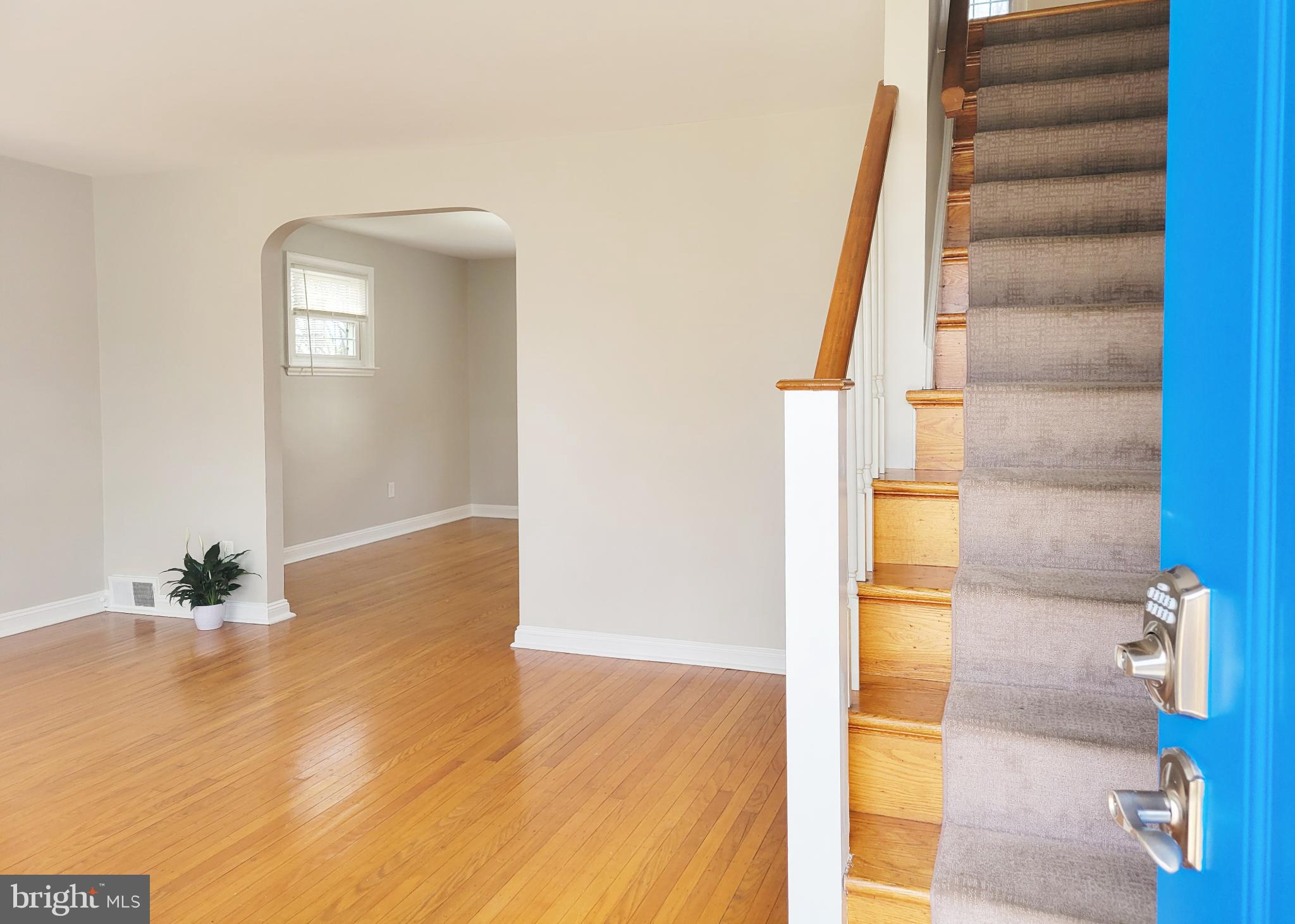 409 Perry Street Ridley Park, PA 19078 - Photo 27 of 66 a view of a room with wooden floor and entryway