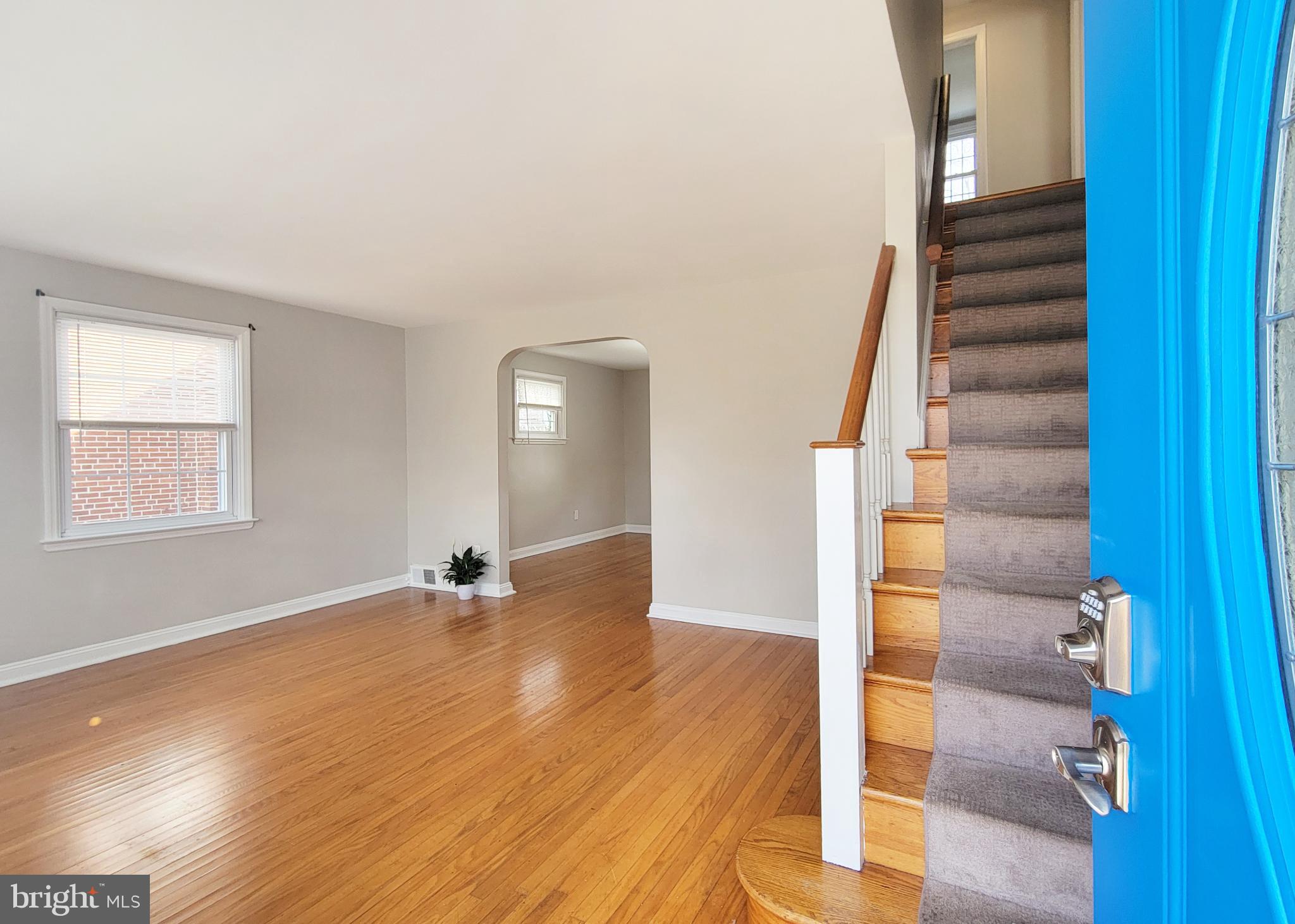 409 Perry Street Ridley Park, PA 19078 - Photo 28 of 66 wooden floor in an empty room with a window