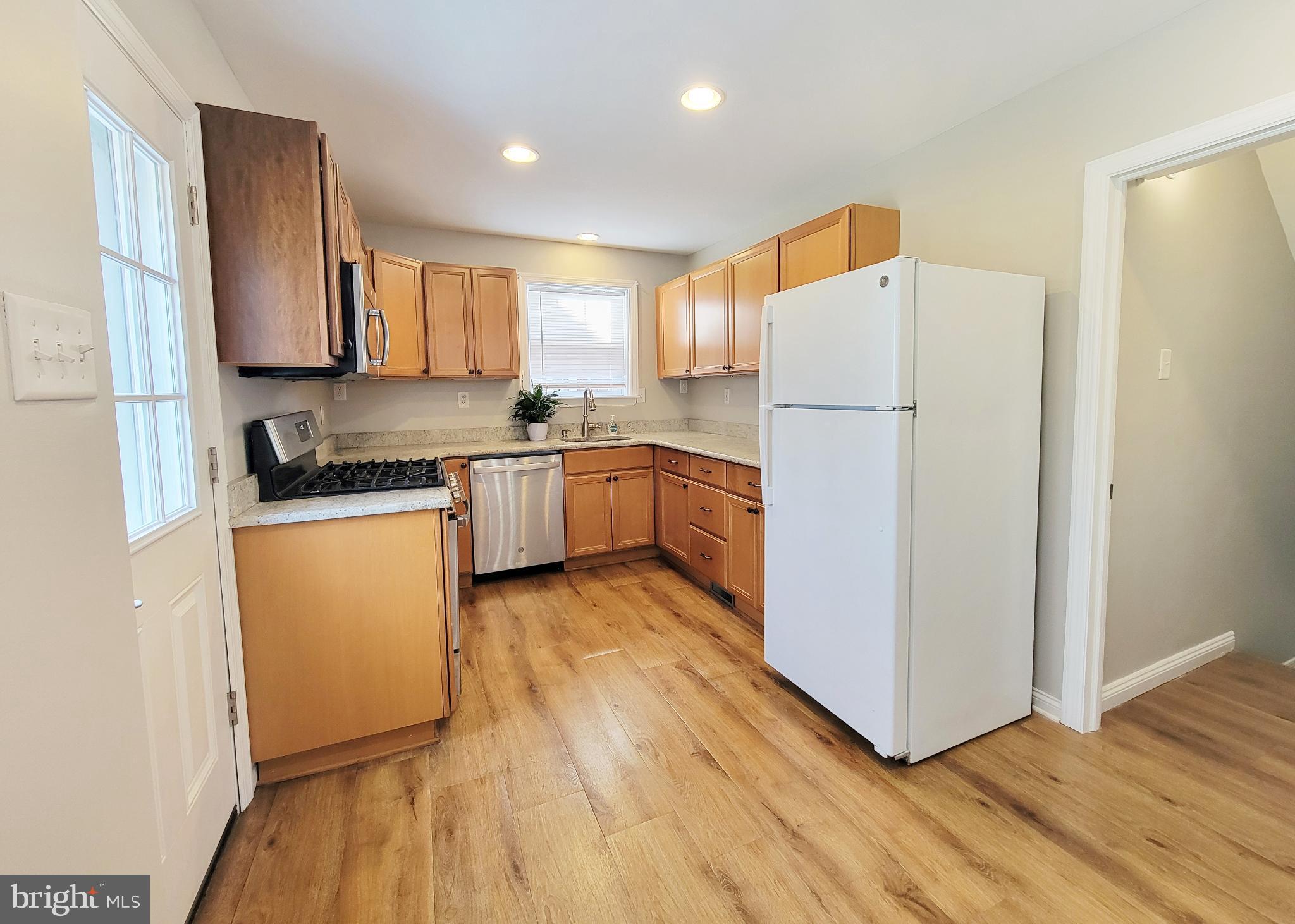409 Perry Street Ridley Park, PA 19078 - Photo 42 of 66 Bright and inviting kitchen with modern finishes.