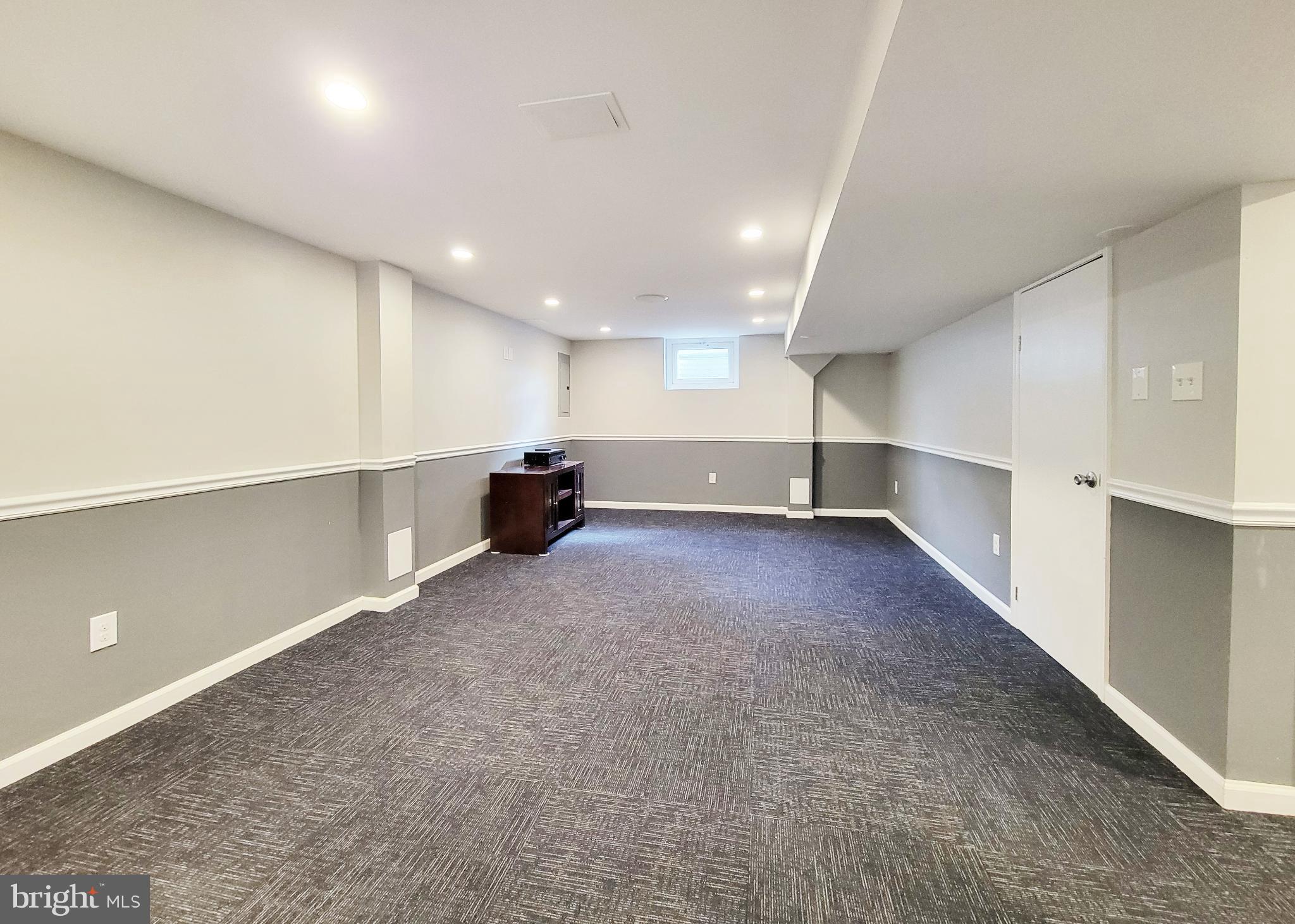 409 Perry Street Ridley Park, PA 19078 - Photo 49 of 66 an empty room with wooden floor and windows