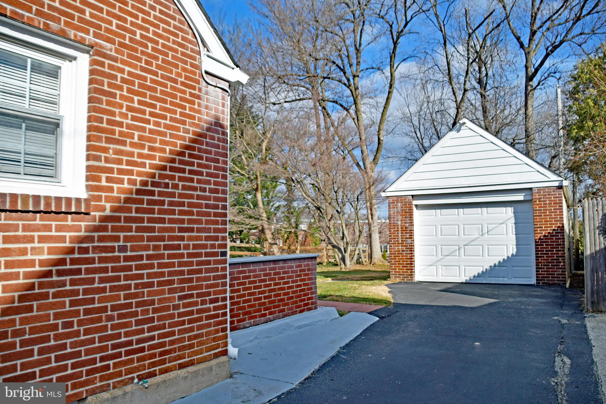 409 Perry Street Ridley Park, PA 19078 - Photo 5 of 66 Charming brick home with a spacious driveway.