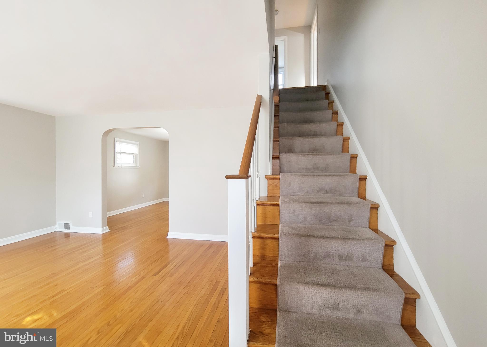 409 Perry Street Ridley Park, PA 19078 - Photo 55 of 66 a view of entryway and hall with wooden floor