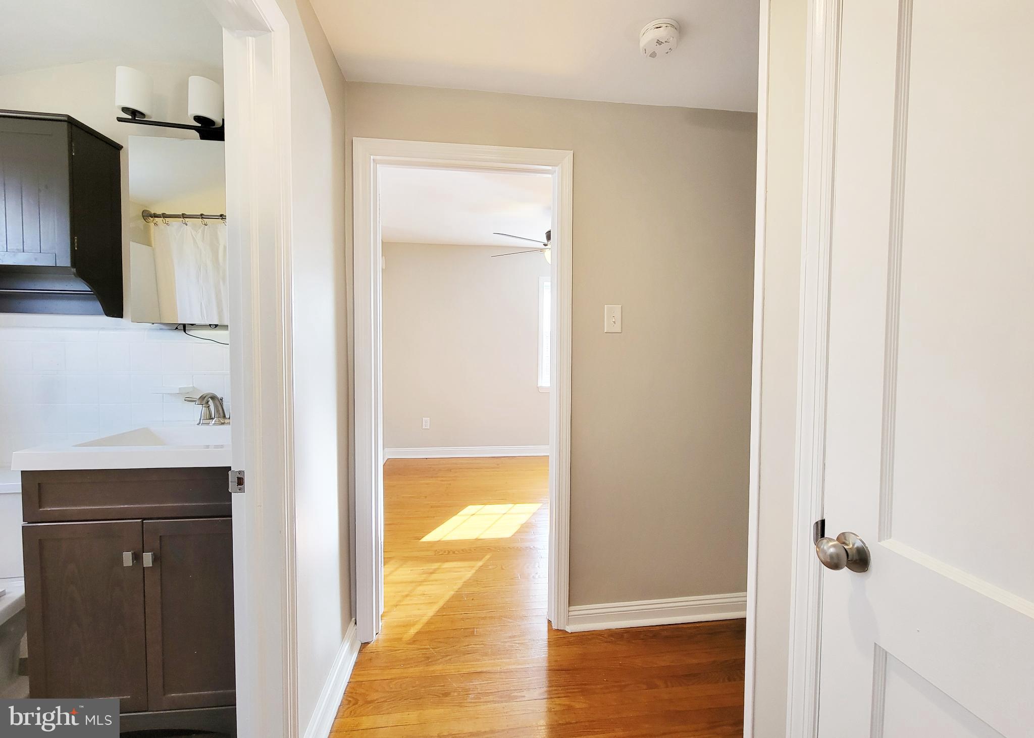 409 Perry Street Ridley Park, PA 19078 - Photo 62 of 66 Bright and inviting hallway with warm tones.