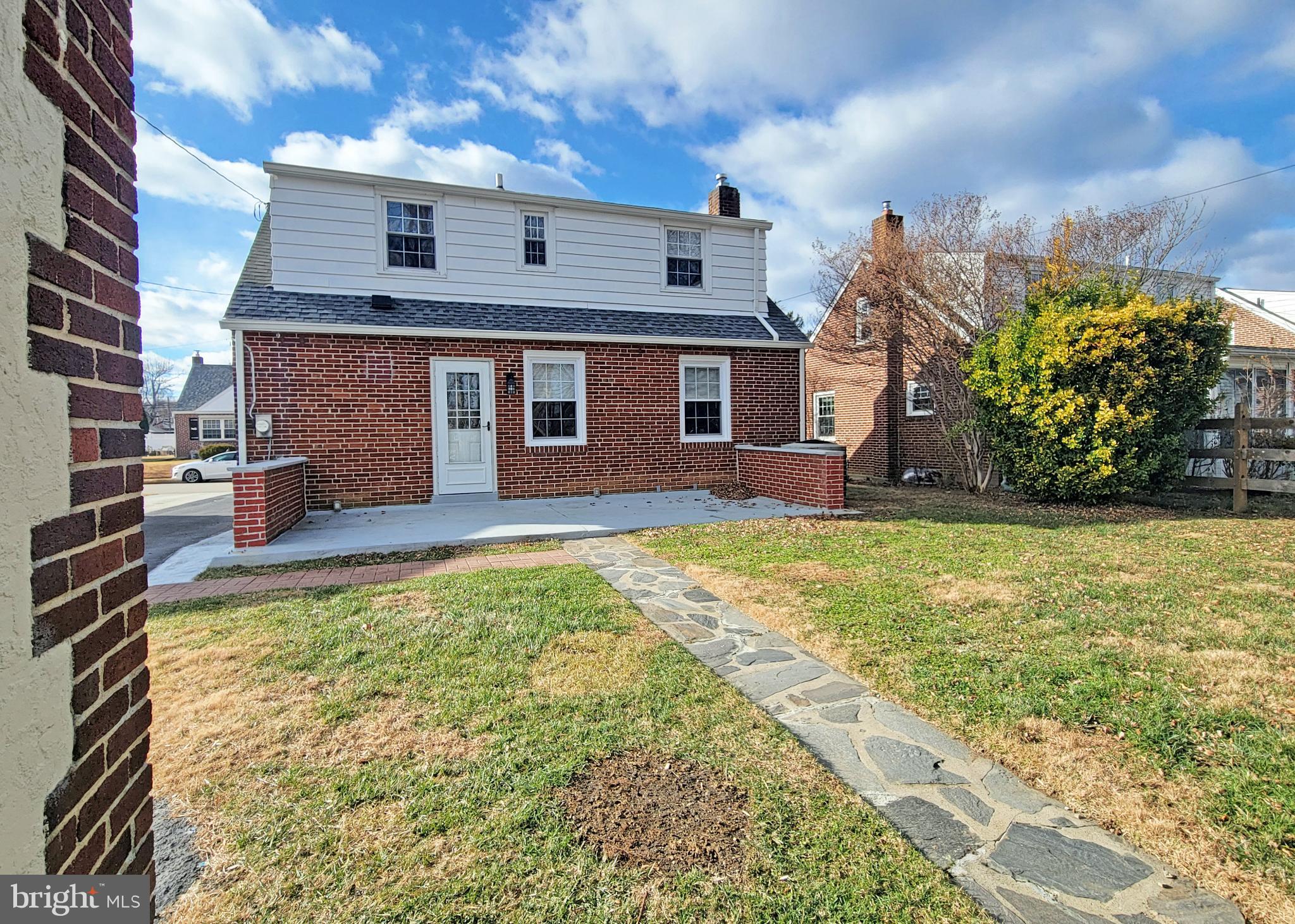 409 Perry Street Ridley Park, PA 19078 - Photo 9 of 66 a view of a house with a swimming pool