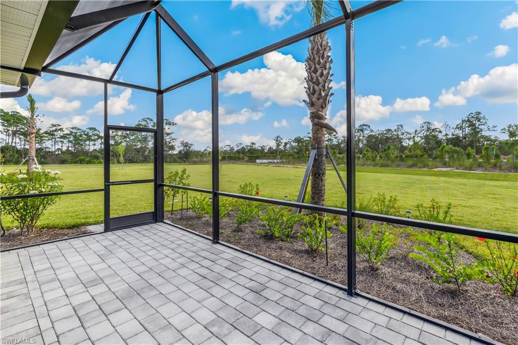 17716 Palmetto Pass Lane Babcock Ranch, FL 33982 - Photo 2 of 20 a view of a deck with a yard