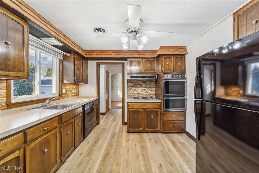 230 Fairfield Road Avon Lake, OH 44012 - Photo 9 of 40 Kitchen featuring newer flooring