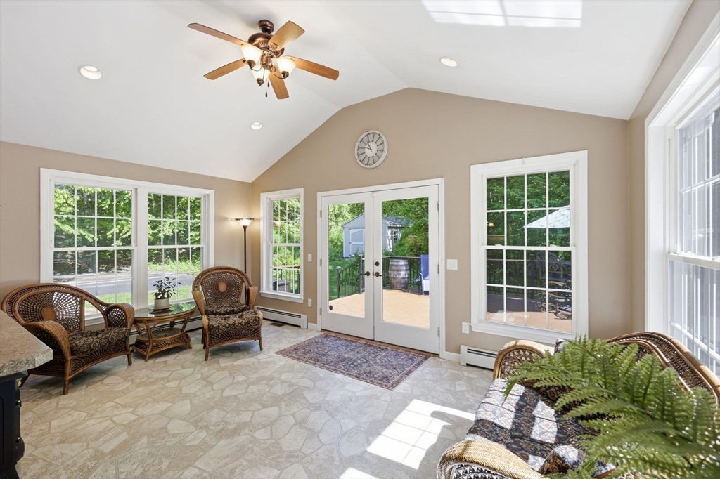 345 Bragg Road Warren, MA 01585 - Photo 16 of 41 a living room with furniture and windows
