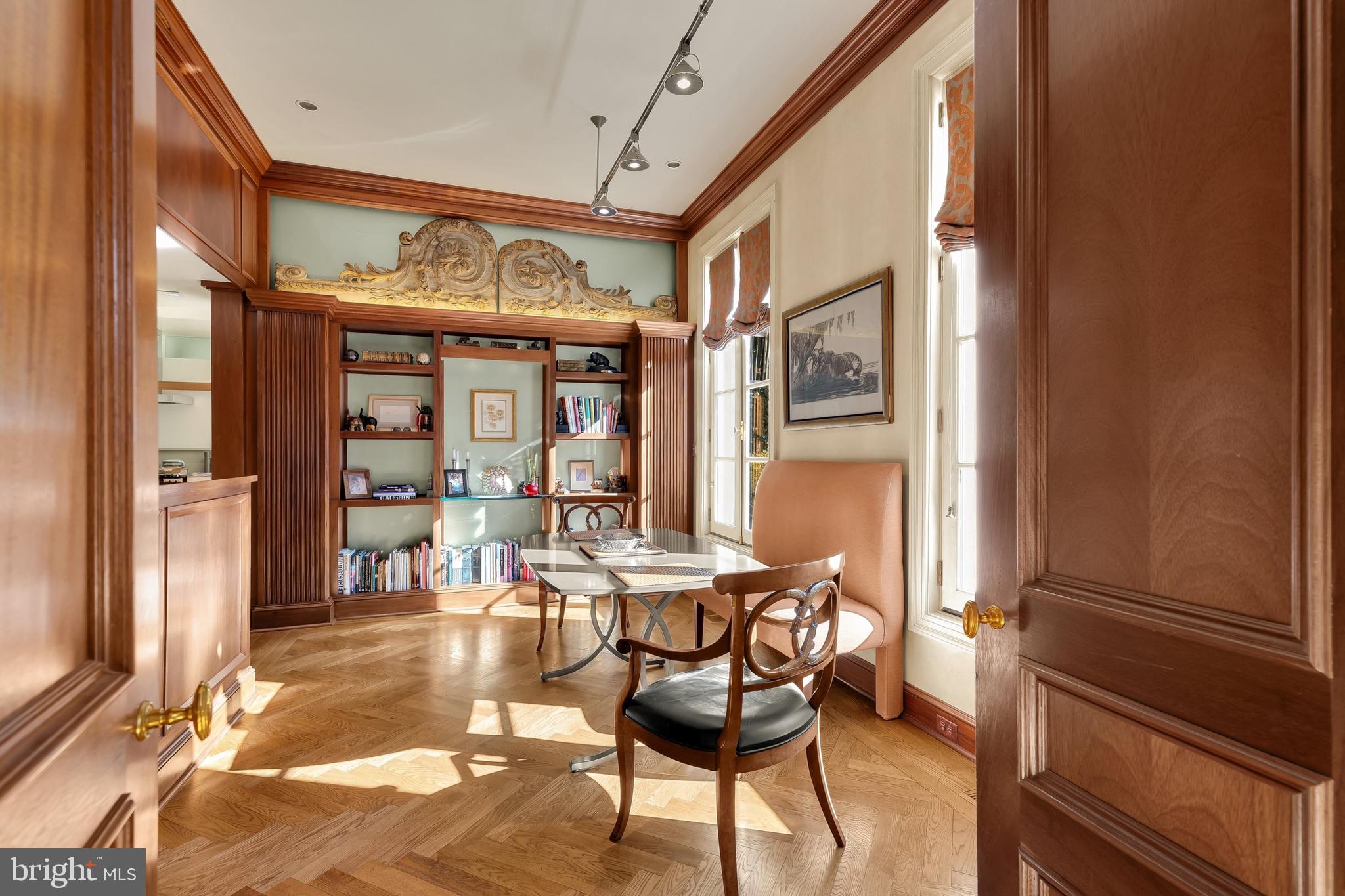 2740 Chain Bridge Road Northwest Washington, DC 20016 - Photo 13 of 50 a view of a dining room with furniture window and wooden floor