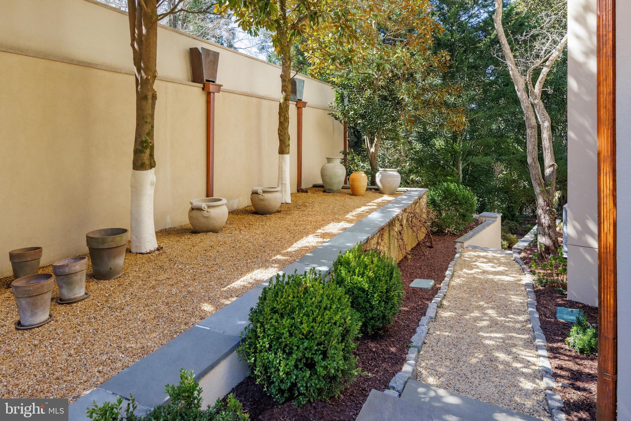 2740 Chain Bridge Road Northwest Washington, DC 20016 - Photo 41 of 50 a view of a backyard with sitting area