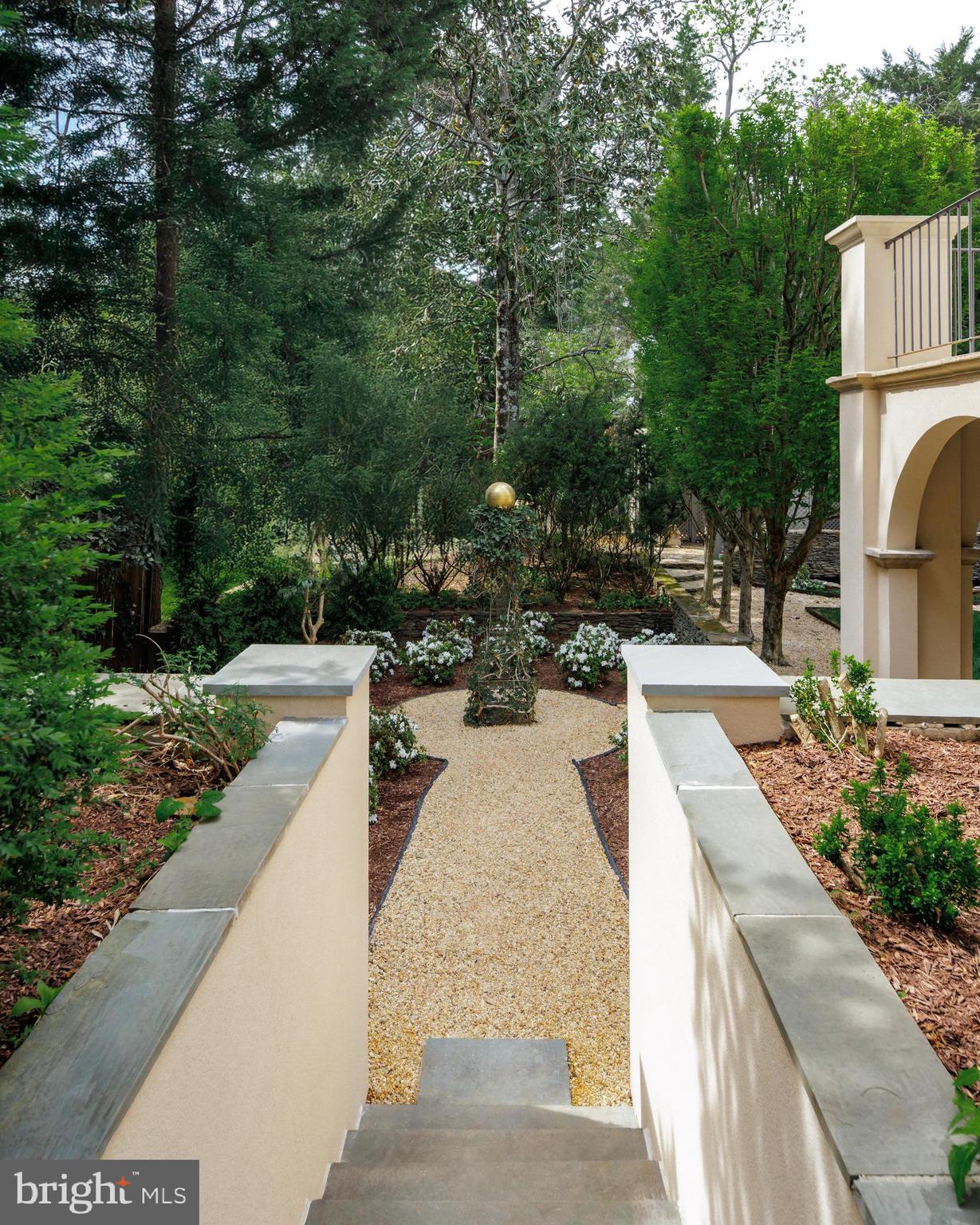 2740 Chain Bridge Road Northwest Washington, DC 20016 - Photo 42 of 50 a view of a swimming pool with a patio