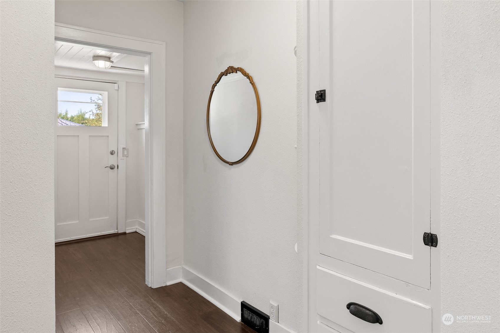 1232 Donovan Lane Everett, WA 98201 - Photo 11 of 34 a view of a room with wooden floor and white walls