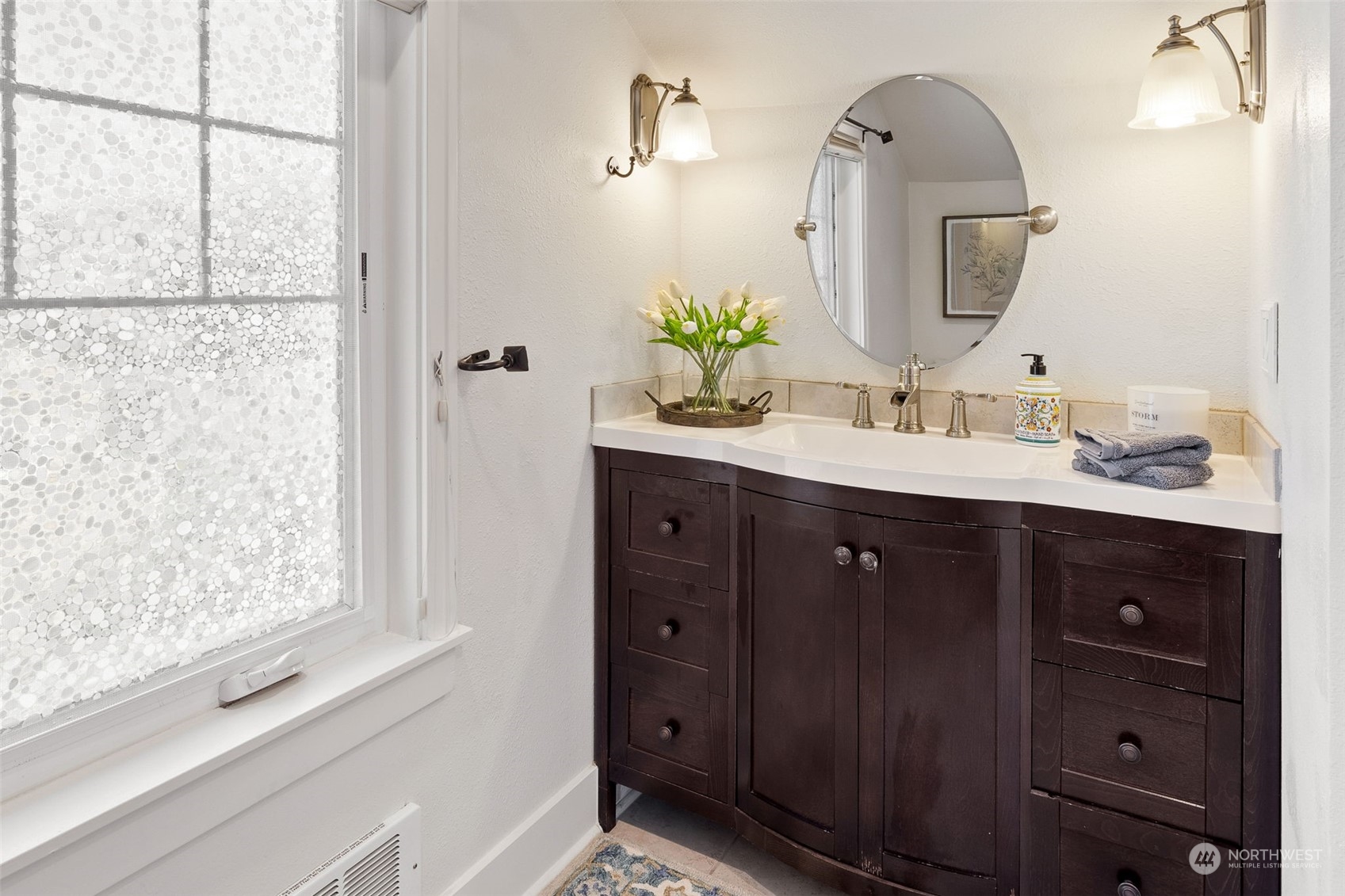 1232 Donovan Lane Everett, WA 98201 - Photo 21 of 34 a bathroom with a double vanity sink and a mirror
