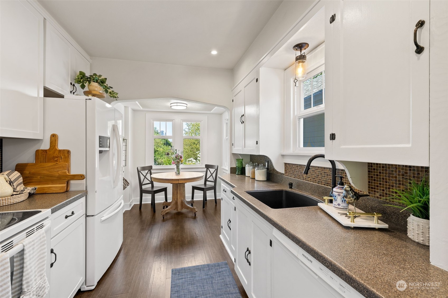 1232 Donovan Lane Everett, WA 98201 - Photo 7 of 34 a kitchen with sink stove and cabinets