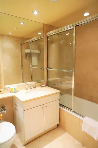 a view of a livingroom with furniture and a window