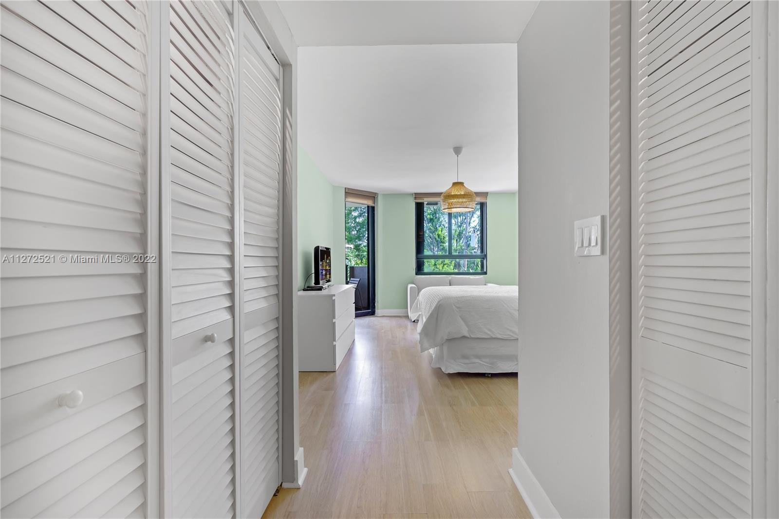 101 Crandon Boulevard, Unit 267 Key Biscayne, FL 33149 - Photo 15 of 57 a view of livingroom with furniture and wooden floor