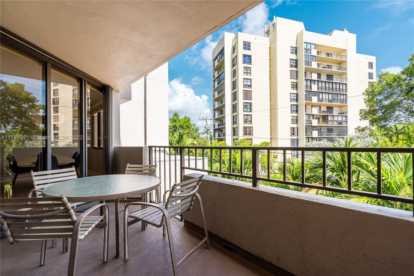 101 Crandon Boulevard, Unit 267 Key Biscayne, FL 33149 - Photo 37 of 57 a balcony view with a large windows