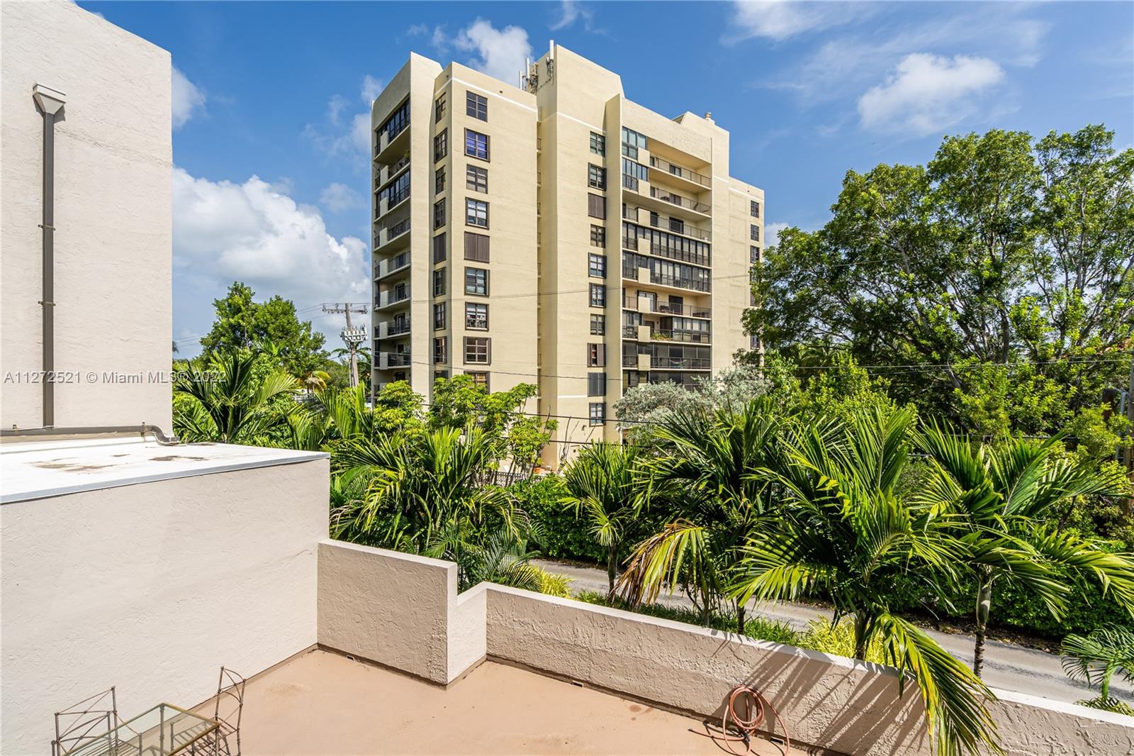 101 Crandon Boulevard, Unit 267 Key Biscayne, FL 33149 - Photo 50 of 57 a view of balcony with potted plants