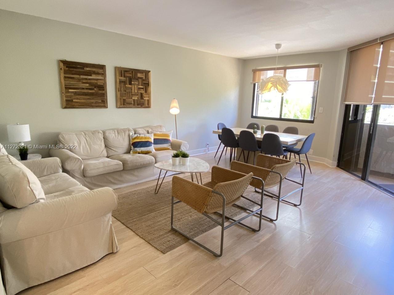 101 Crandon Boulevard, Unit 267 Key Biscayne, FL 33149 - Photo 57 of 57 a living room with furniture and a window