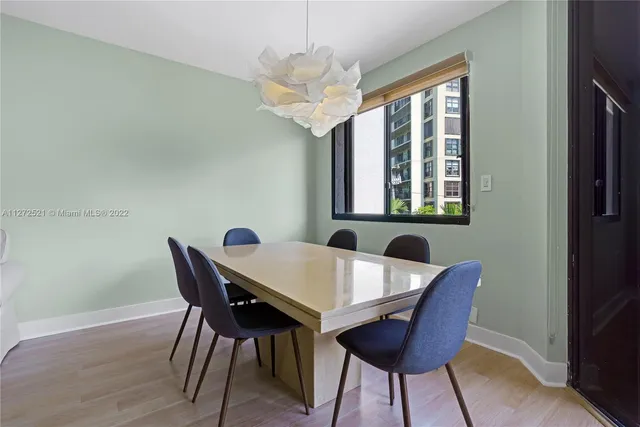 a kitchen with a sink cabinets and stainless steel appliances