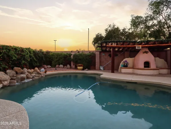 a view of a garden with a house