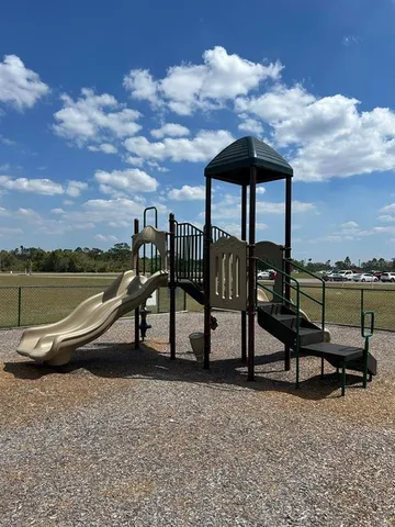 a park view with a bench