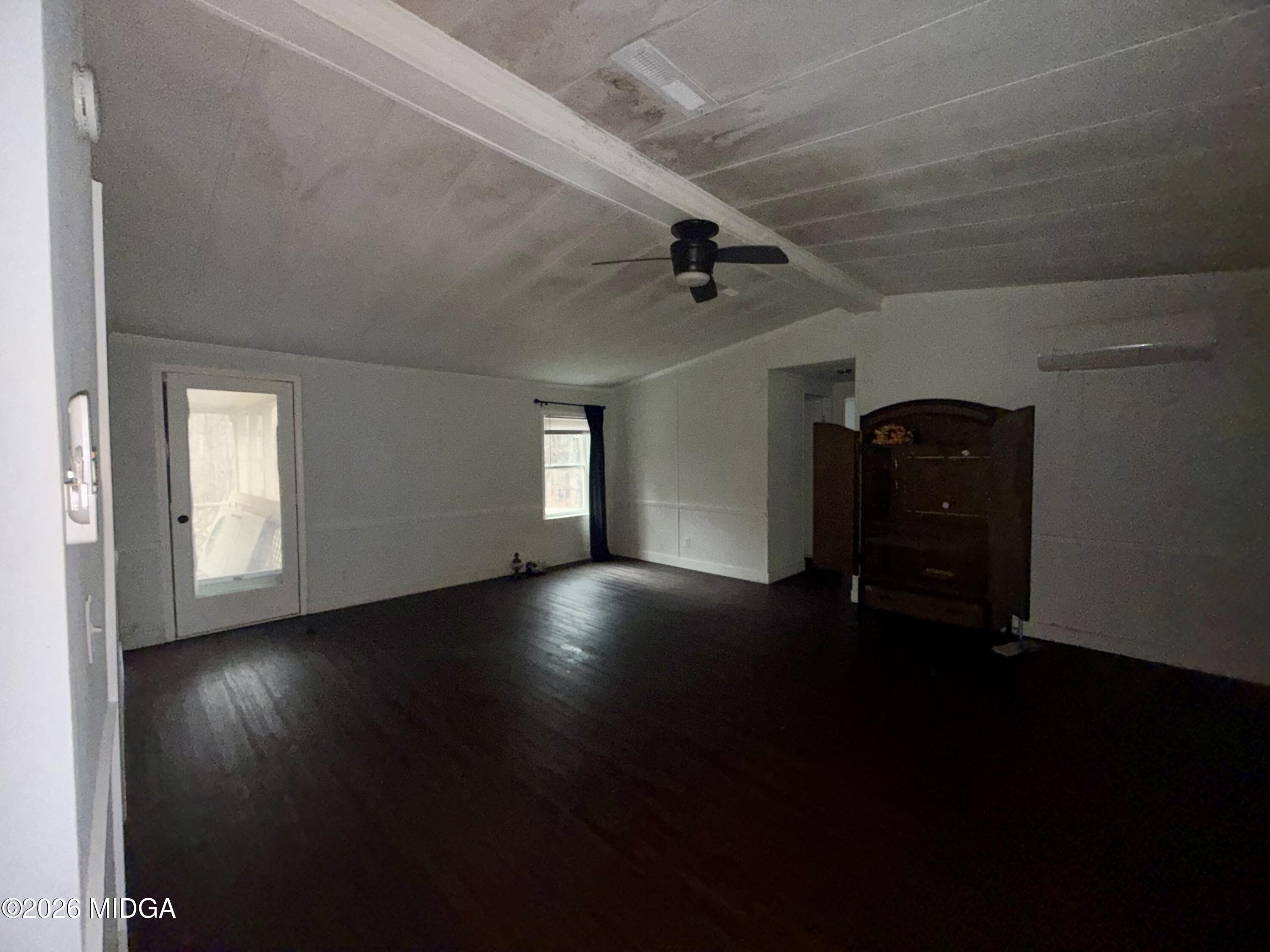 307 Old Dames Ferry Road Juliette, GA 31046 - Photo 4 of 13 a view of a livingroom with wooden floor and a window