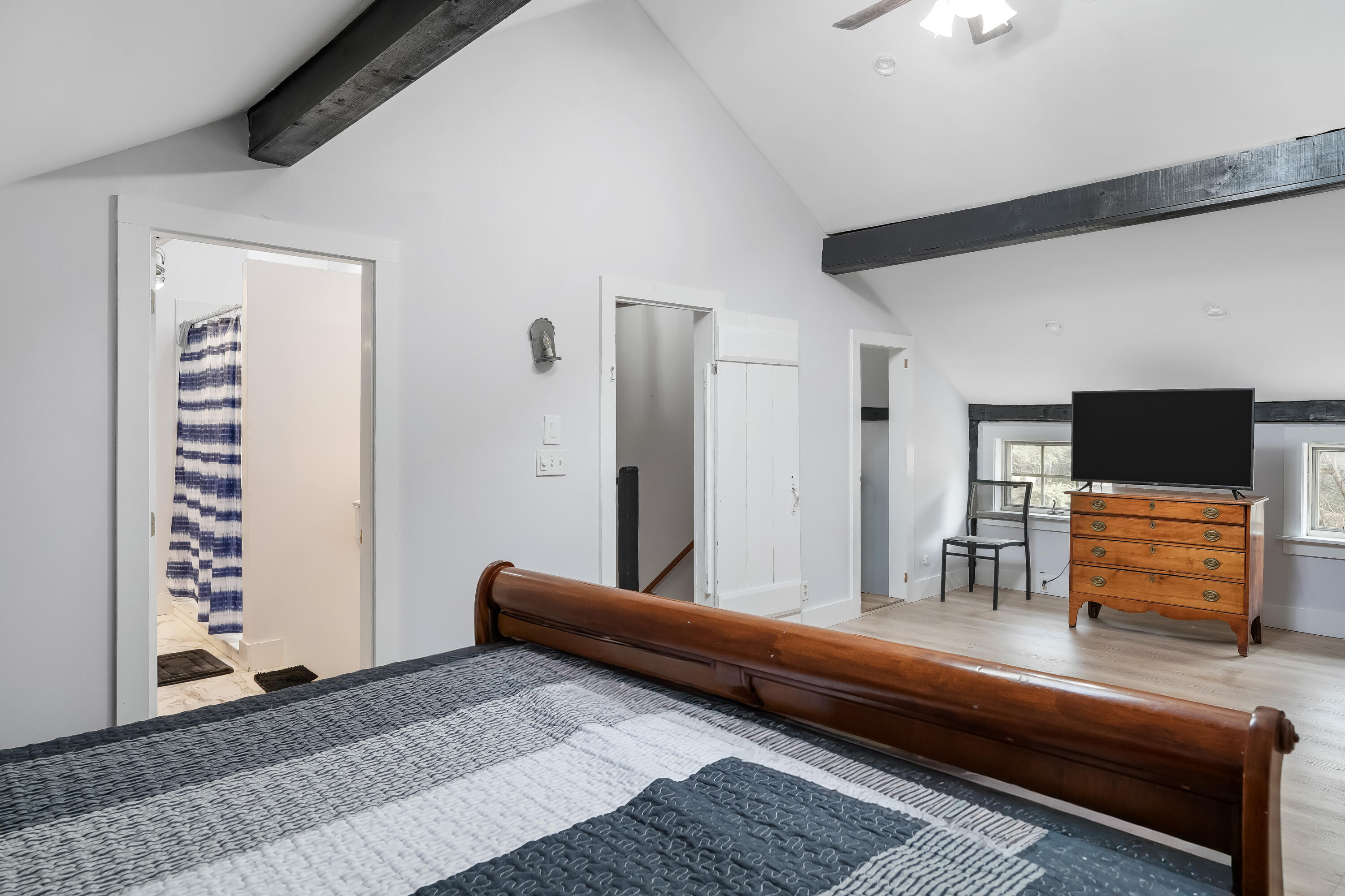 32 Norton Orchard Road Edgartown, MA 02539 - Photo 21 of 26 a bedroom with furniture and flat screen tv