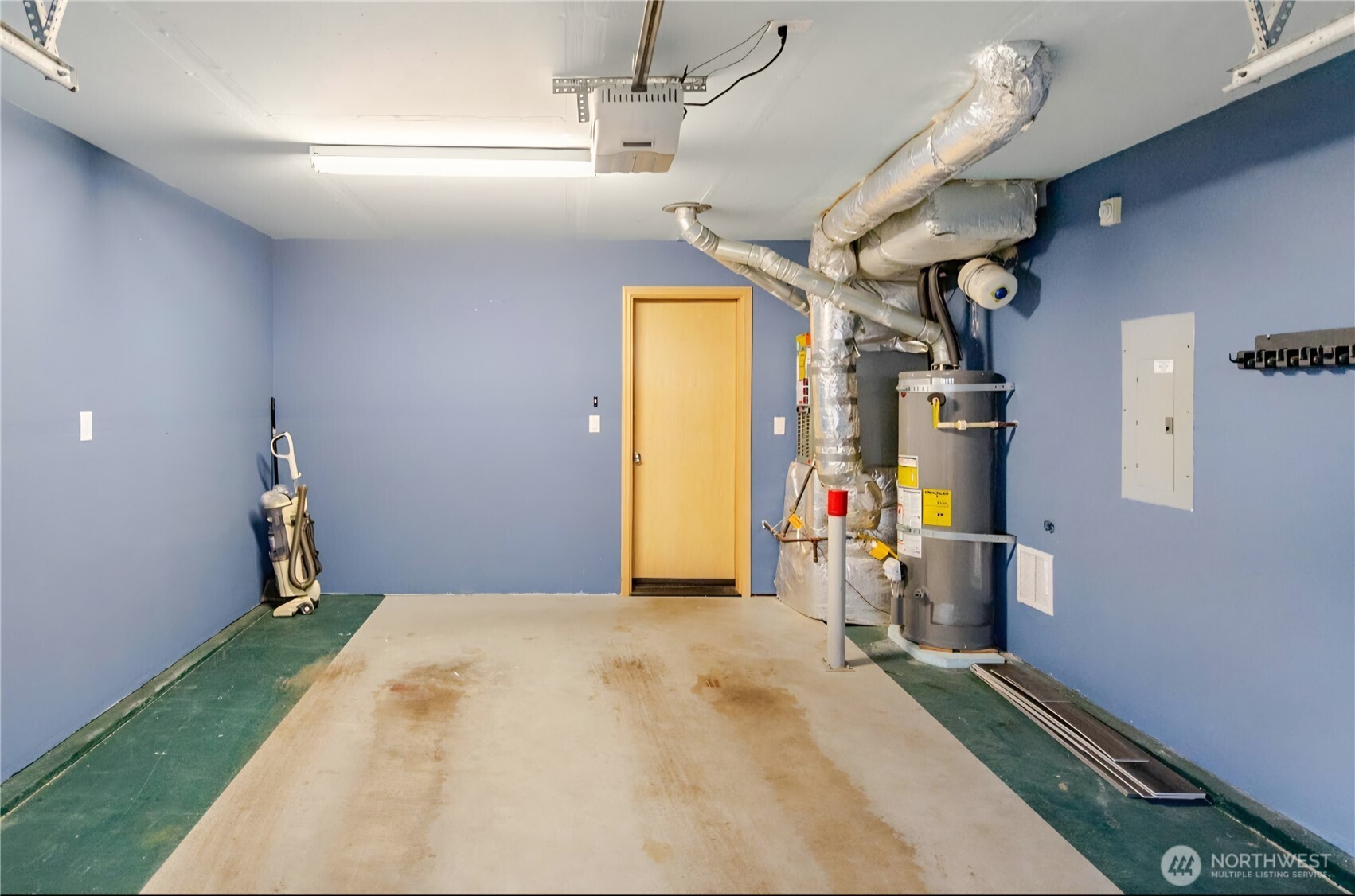 10047 17th Avenue Southwest Seattle, WA 98146 - Photo 25 of 27 a view of a room with gym equipment