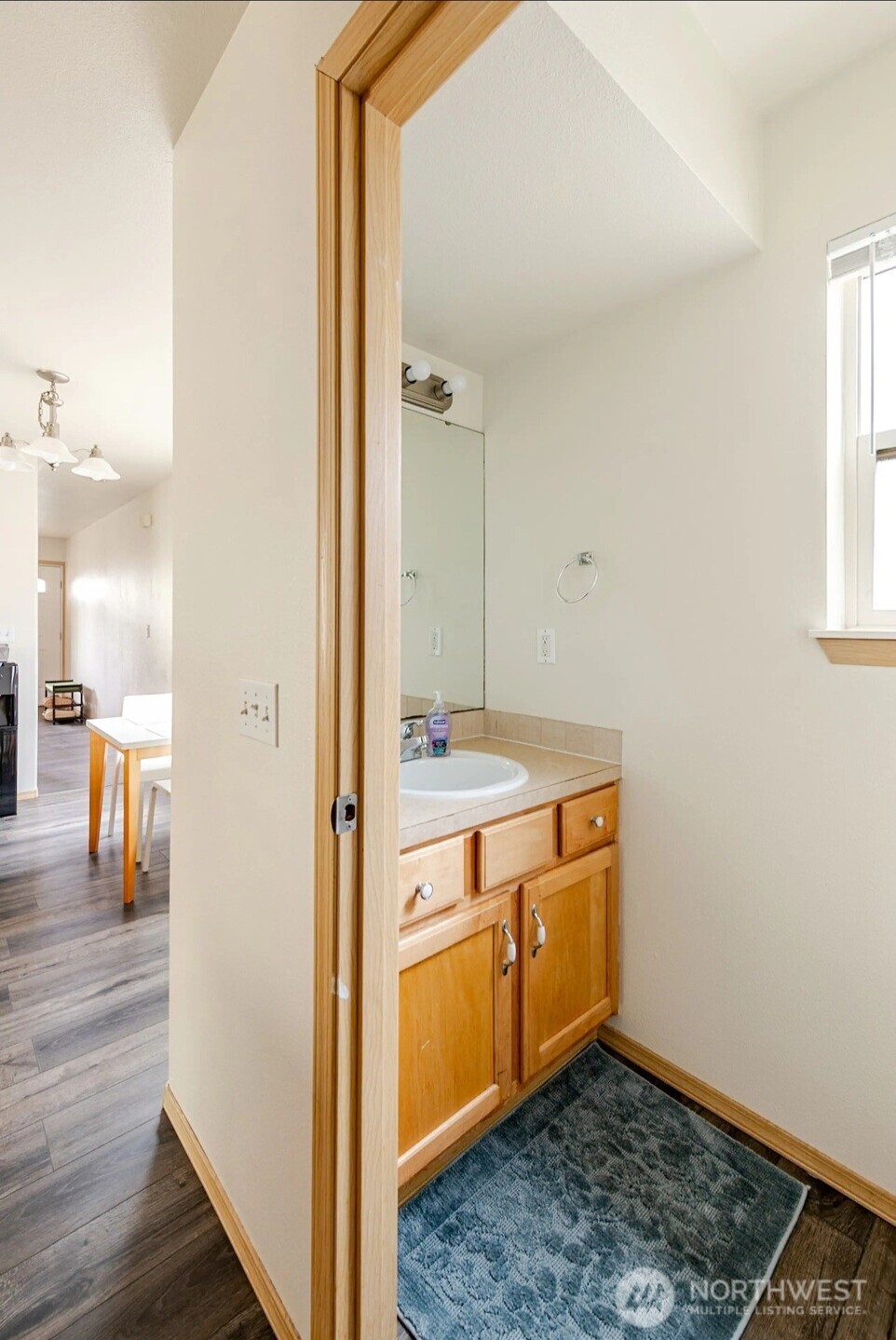 10047 17th Avenue Southwest Seattle, WA 98146 - Photo 5 of 27 a view of hallway with wooden floor