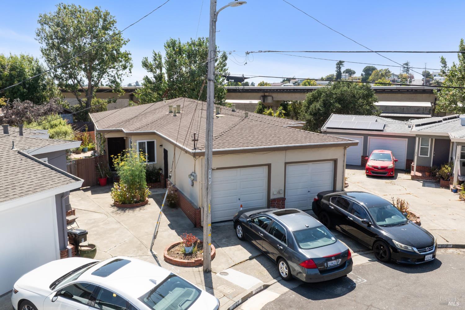 a view of a patio in back of a house