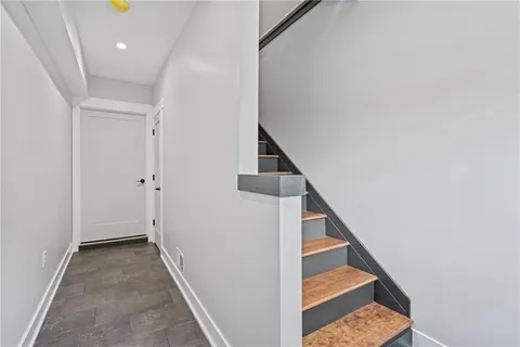 a view of entryway with stairs