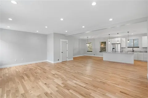 a view of kitchen with wooden floor