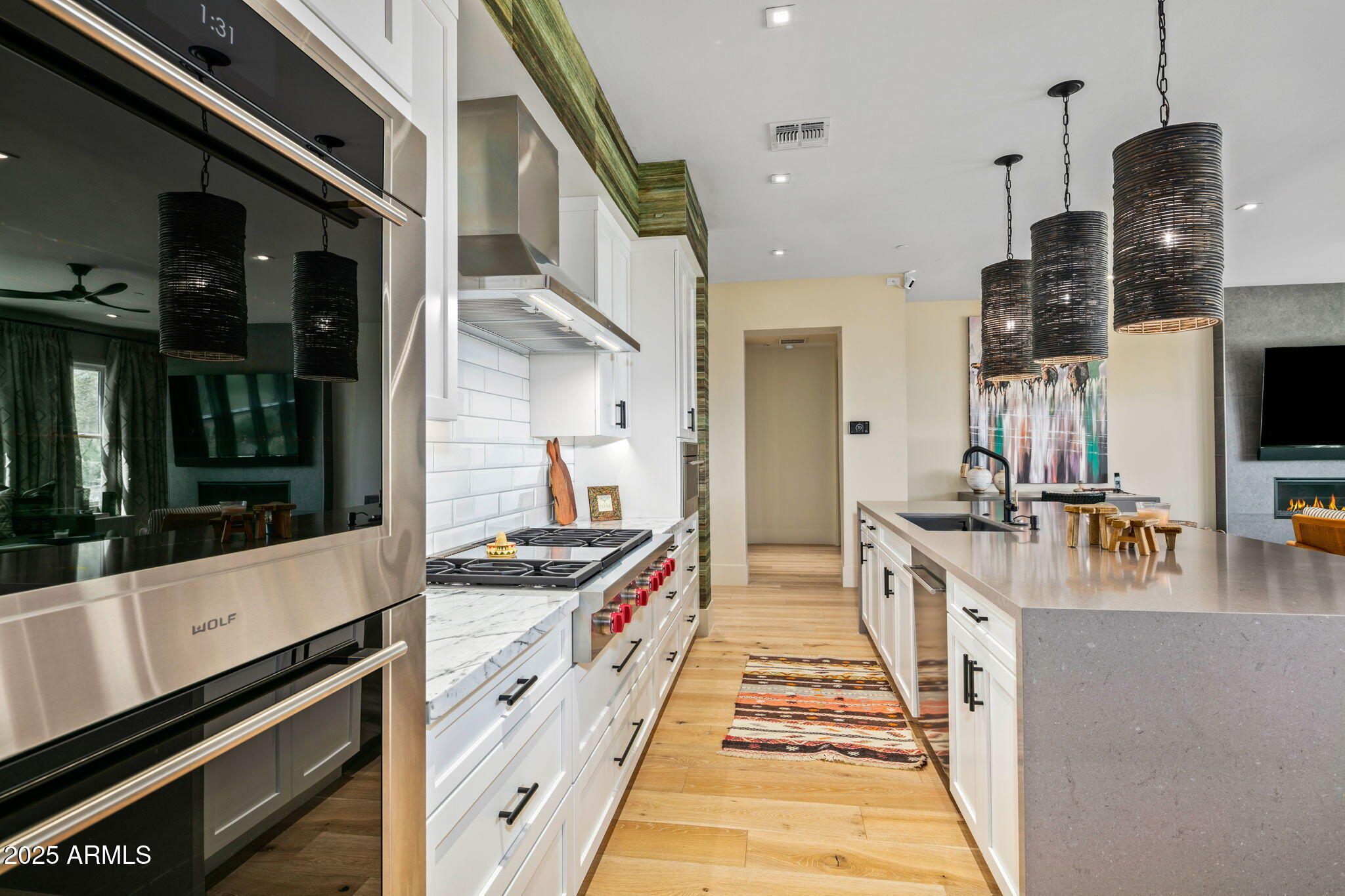 37200 North Cave Creek Road, Unit 1126 Scottsdale, AZ 85262 - Photo 12 of 28 a kitchen with stainless steel appliances granite countertop a stove and a sink