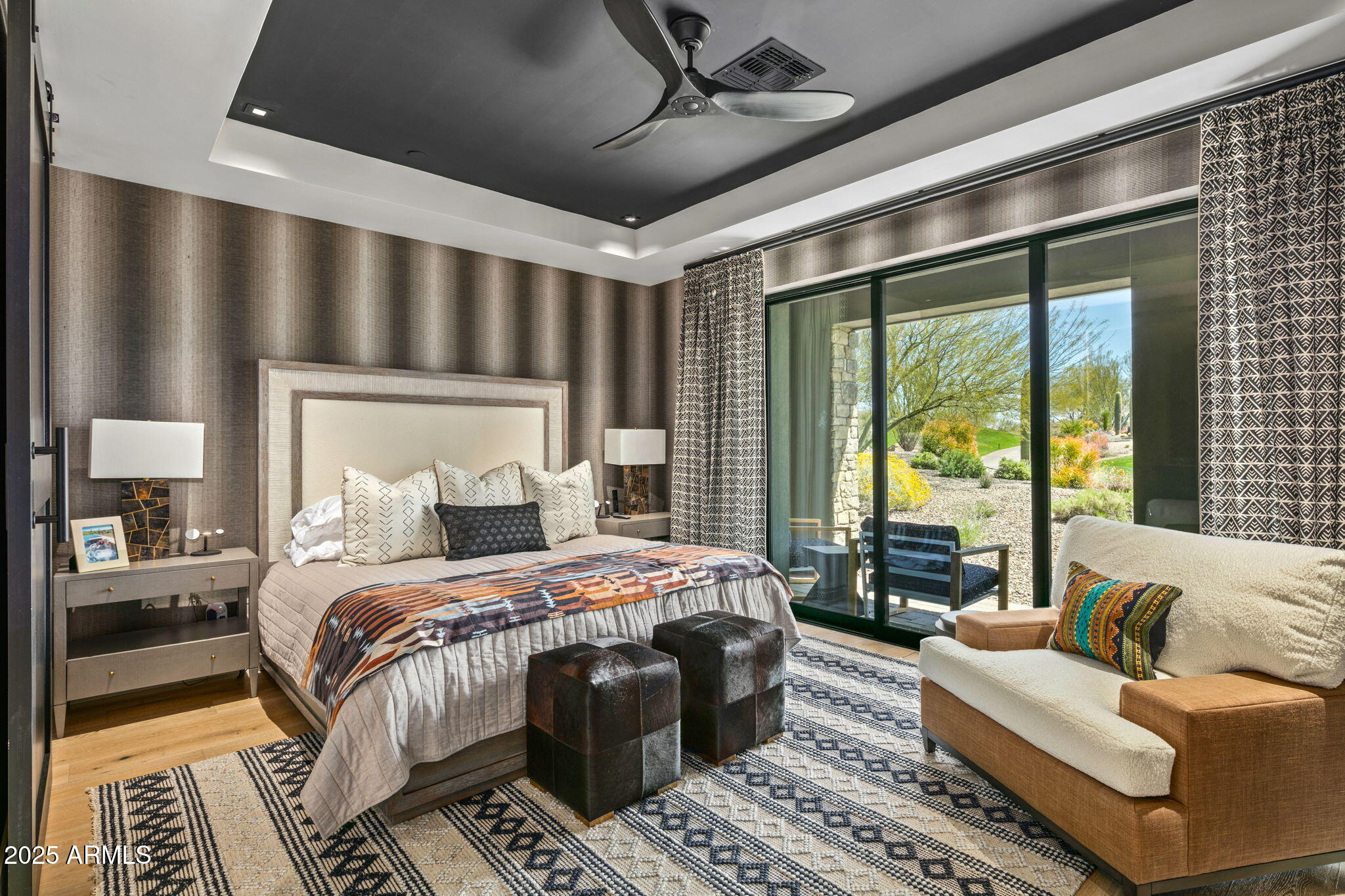 37200 North Cave Creek Road, Unit 1126 Scottsdale, AZ 85262 - Photo 16 of 28 a bedroom with a large bed couch and a large window