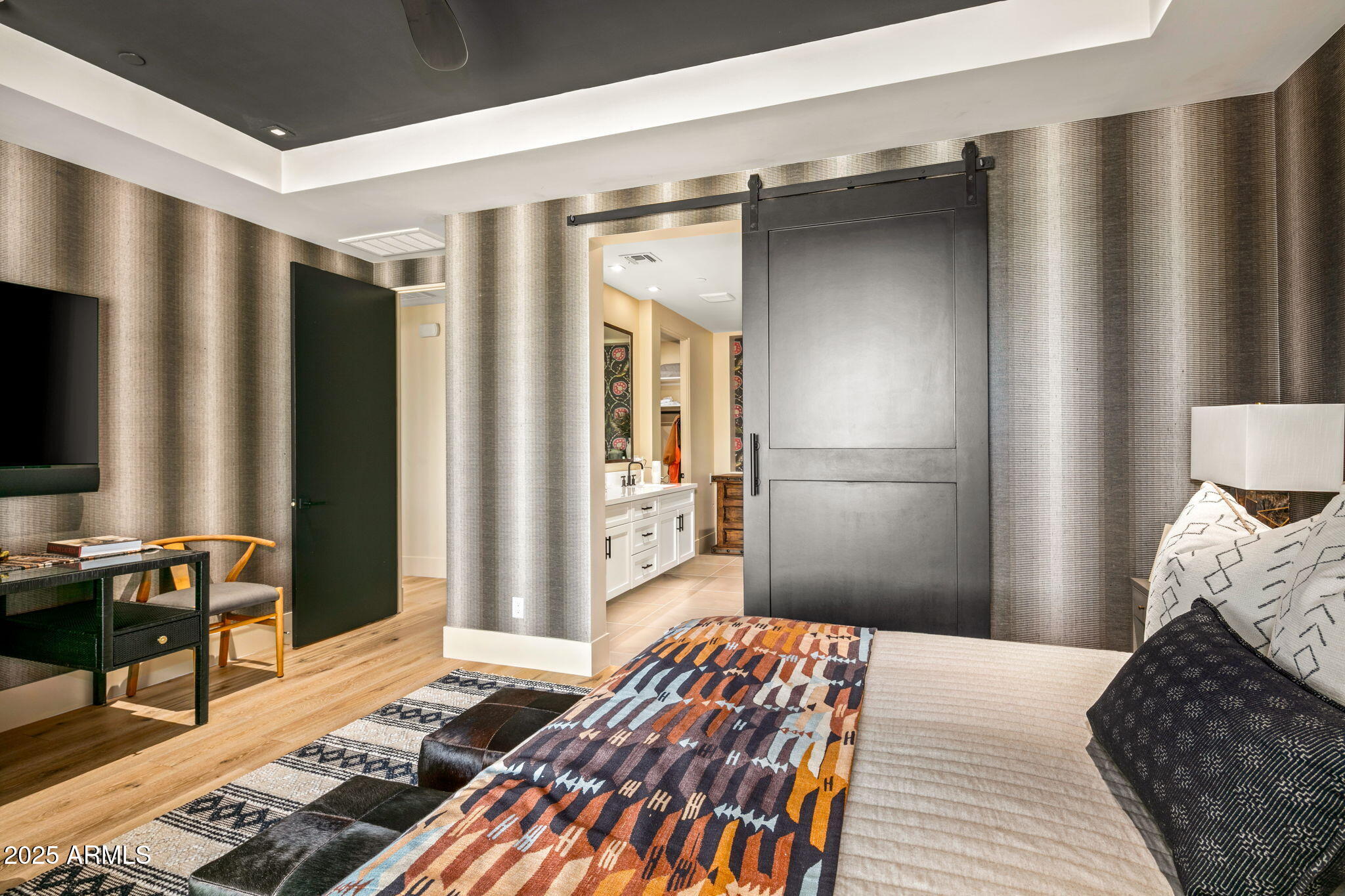 37200 North Cave Creek Road, Unit 1126 Scottsdale, AZ 85262 - Photo 18 of 28 a bedroom with bed and wooden floor