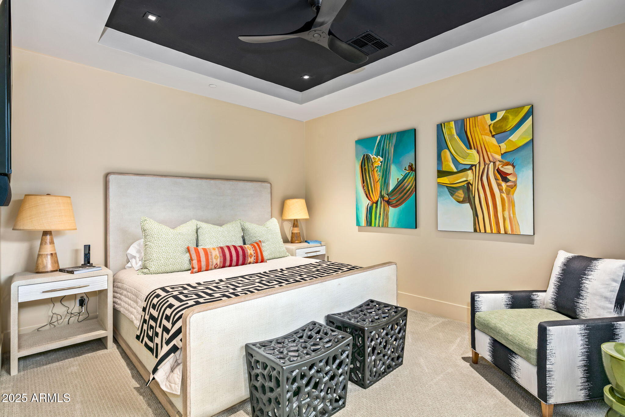 37200 North Cave Creek Road, Unit 1126 Scottsdale, AZ 85262 - Photo 21 of 28 a bedroom with a bed and a couch