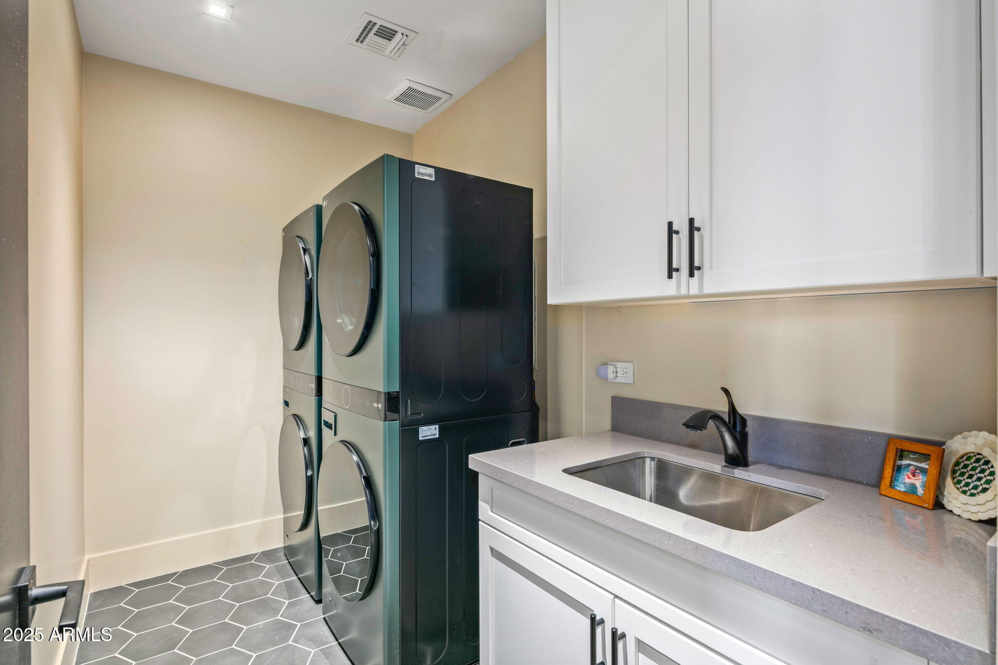 37200 North Cave Creek Road, Unit 1126 Scottsdale, AZ 85262 - Photo 23 of 28 a bathroom with a sink and mirror