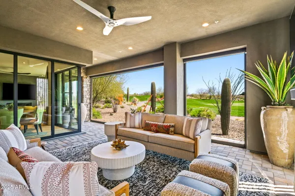 a view of a golf course with a big yard