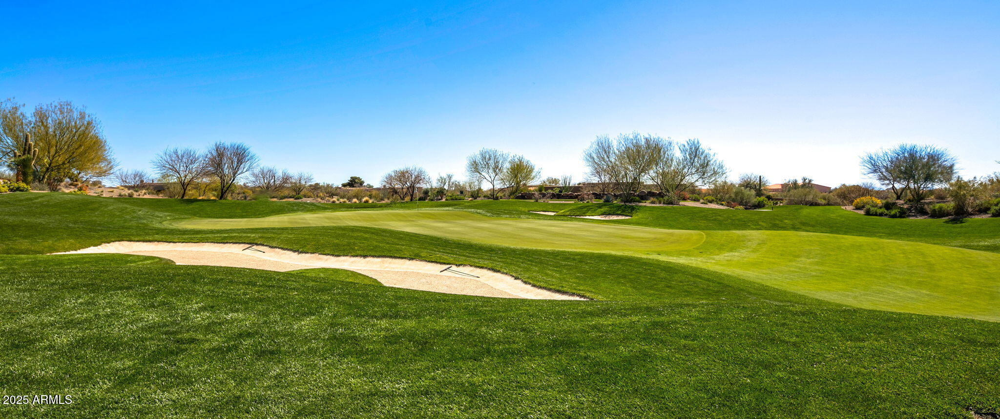 37200 North Cave Creek Road, Unit 1126 Scottsdale, AZ 85262 - Photo 27 of 28 a view of a golf course with a big yard