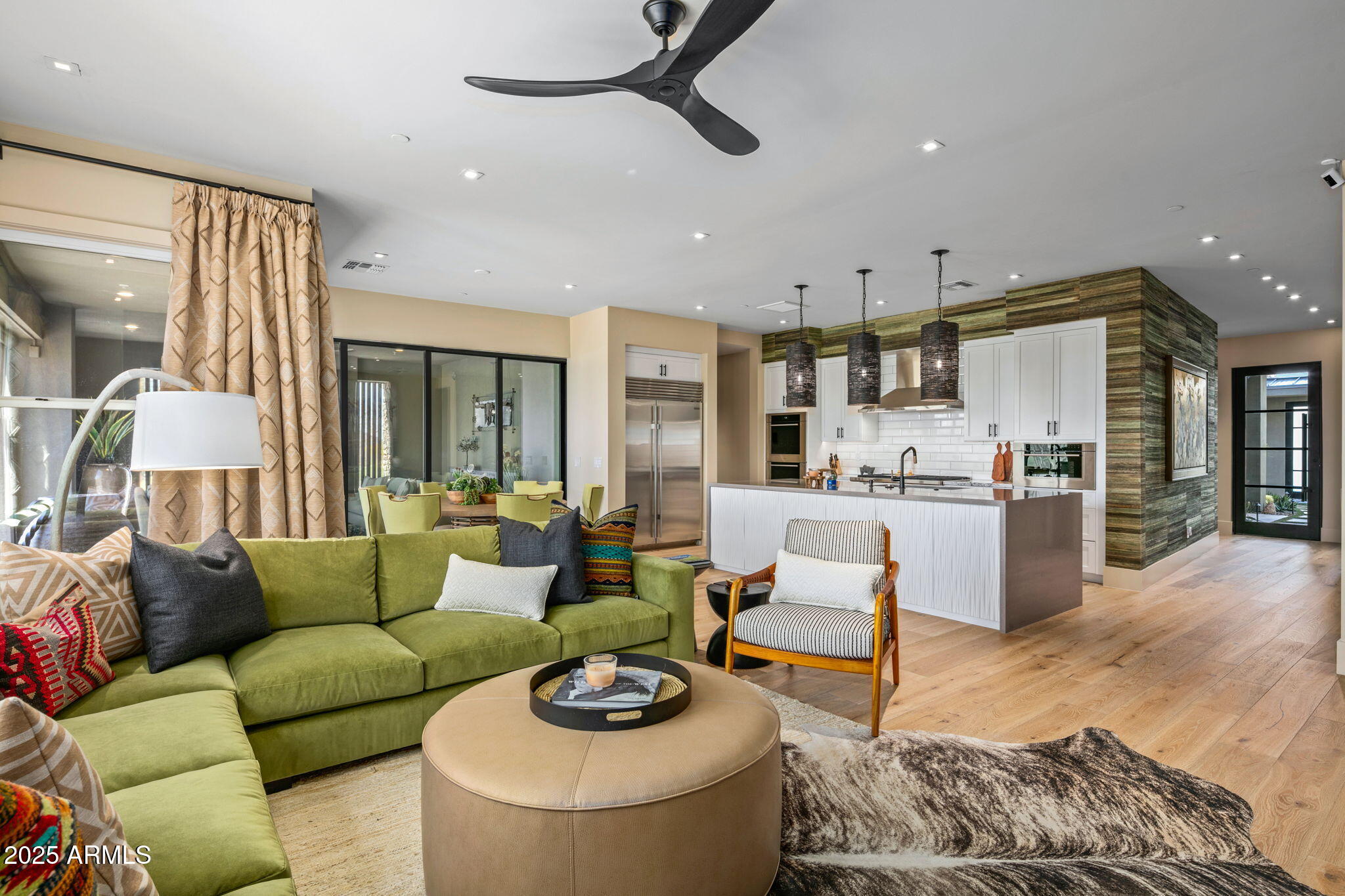 37200 North Cave Creek Road, Unit 1126 Scottsdale, AZ 85262 - Photo 8 of 28 a living room with furniture and a view of kitchen