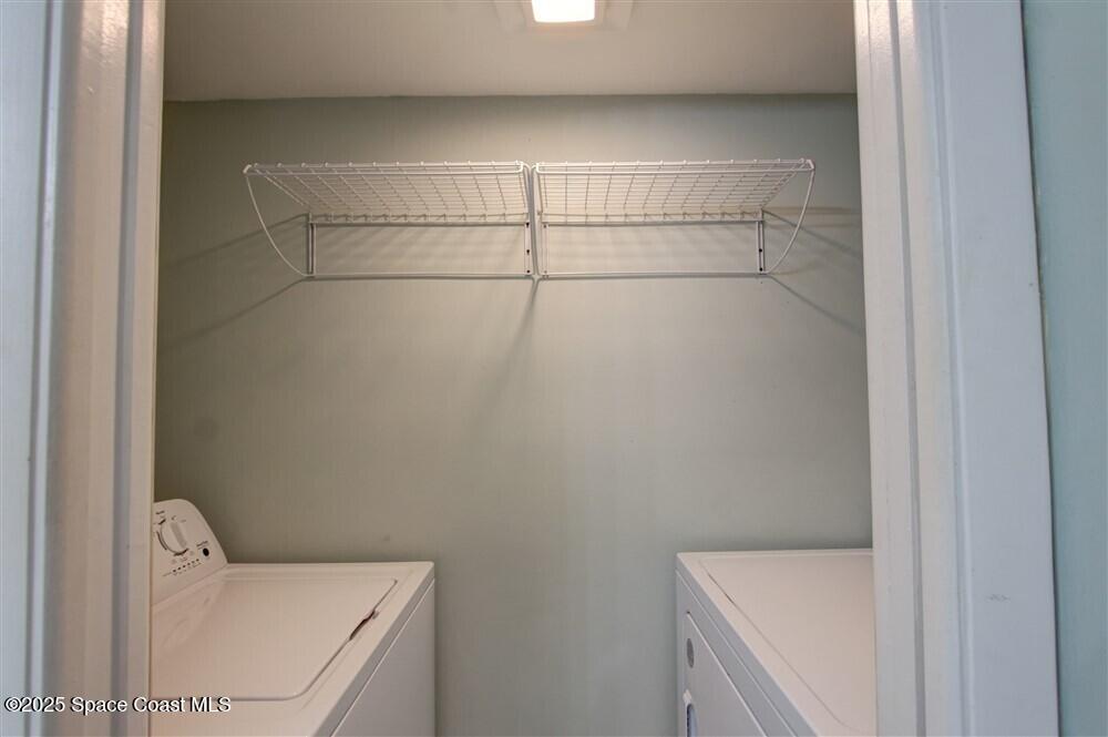 1717 Patty Circle Northeast Palm Bay, FL 32905 - Photo 17 of 35 a bathroom with a sink and vanity
