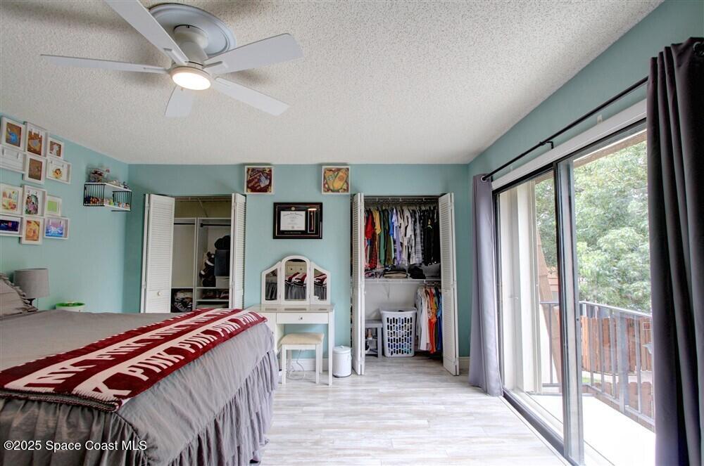 1717 Patty Circle Northeast Palm Bay, FL 32905 - Photo 21 of 35 a bedroom with furniture and window