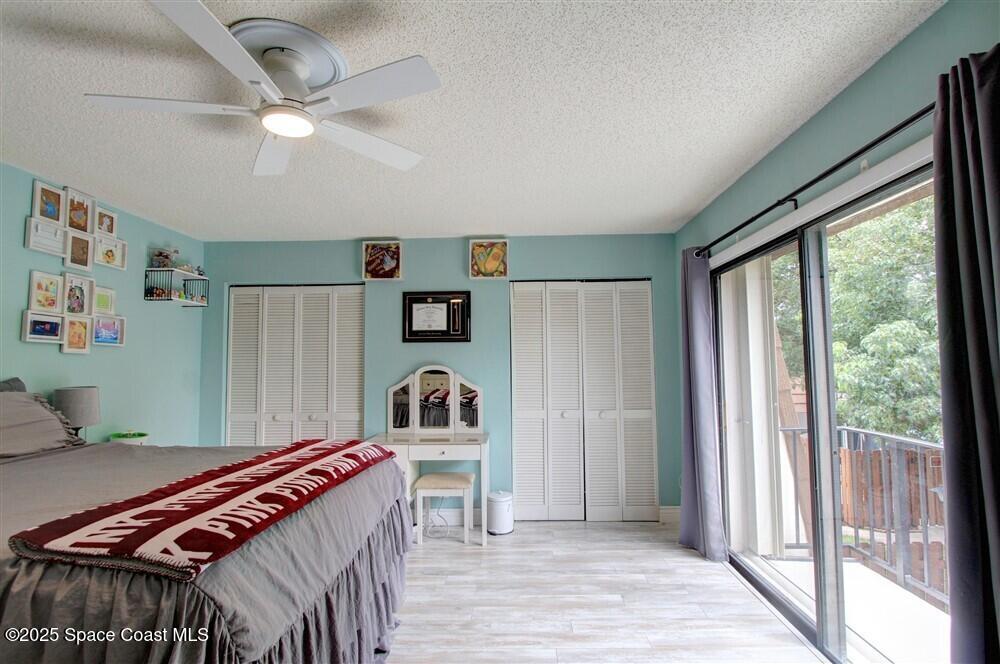 1717 Patty Circle Northeast Palm Bay, FL 32905 - Photo 24 of 35 a bedroom with furniture and a window