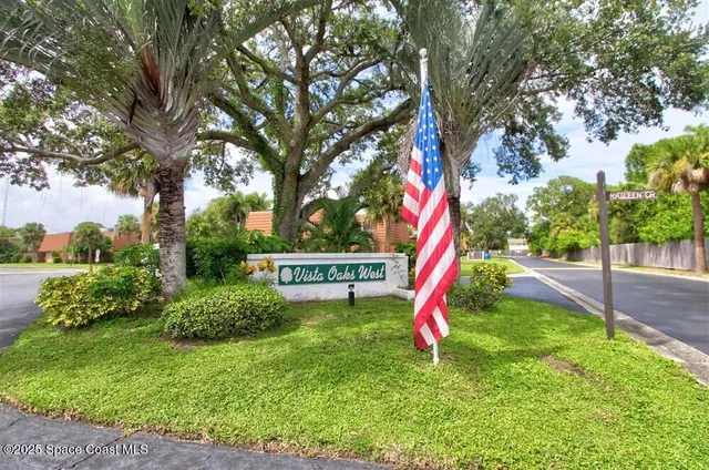 a view of a park with swings and slides