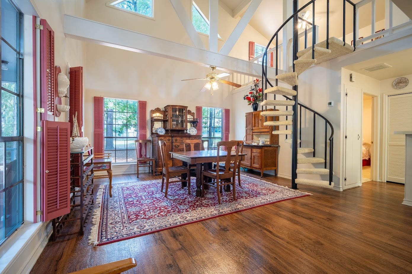 565 Timber Bay Drive Trinity, TX 75862 - Photo 12 of 49 spiral staircase and lots of windows