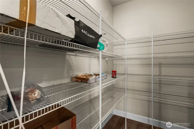 a view of a room with racks on the wall